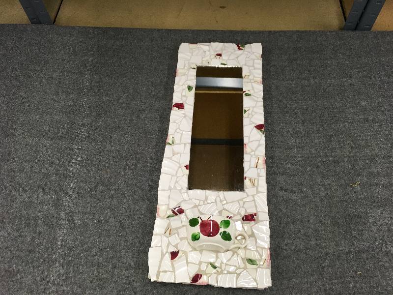 lot 79 image: Apple Design Mirror