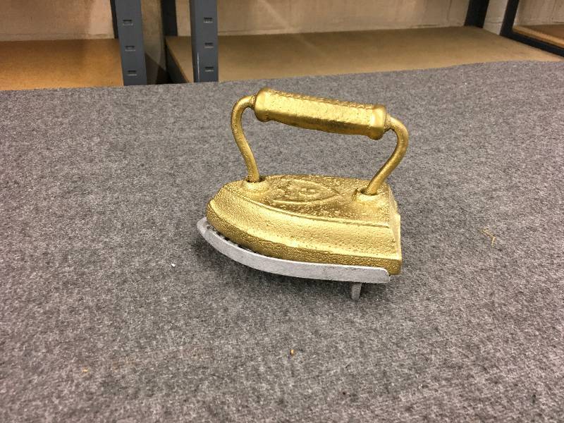 lot 99 image: Gold Iron