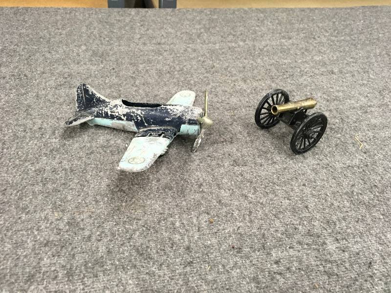 lot 105 image: Airplane & Cannon