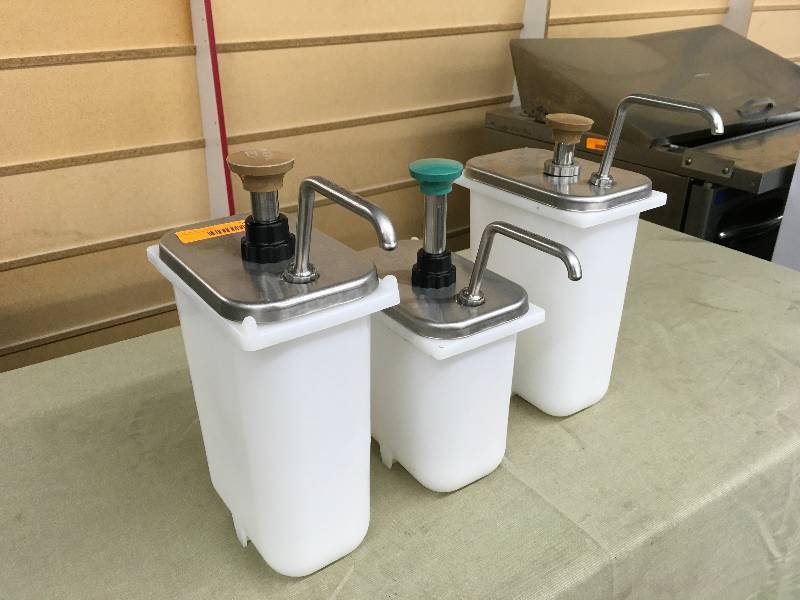 lot 28 image: Three Condiment Dispensers