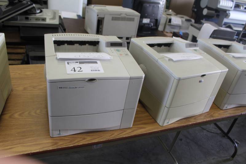 lot 42 image: Lot of (2) HP LaserJet 4100n Printers
