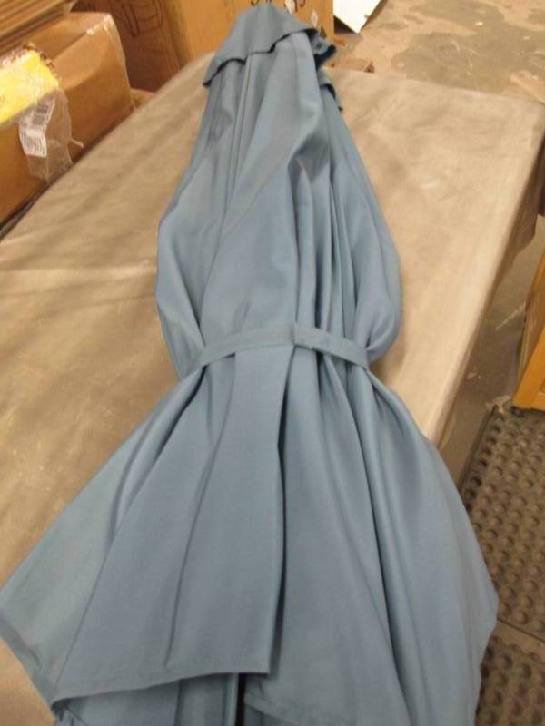 lot 85 image: 7.5 ft Umbrella open box...