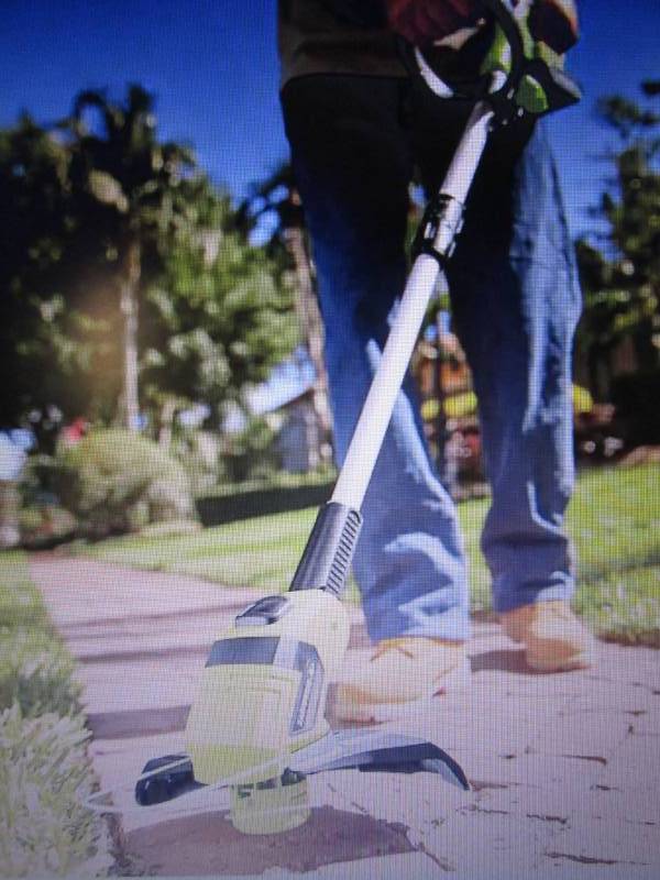 lot 191 image: 20-Volt 10 String Trimmer by Earth...