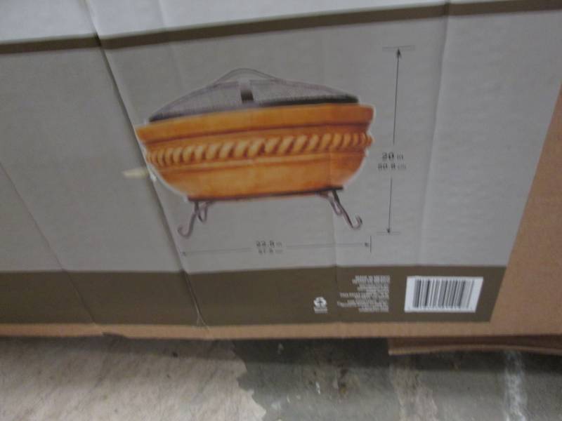 lot 199 image: 20 in. Clay Fire Pit with Iron Stan...