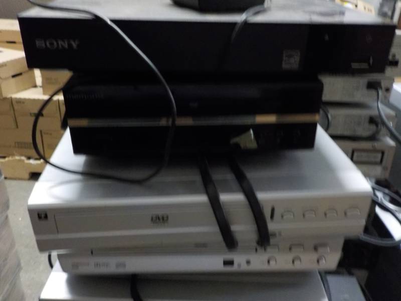 lot 6 image: Jwin, DVD, Memorex, and Sony all po...