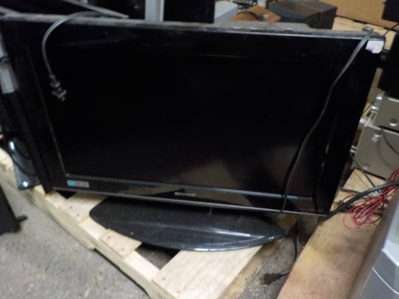 lot 15 image: Sharp 25 TV all powers on...