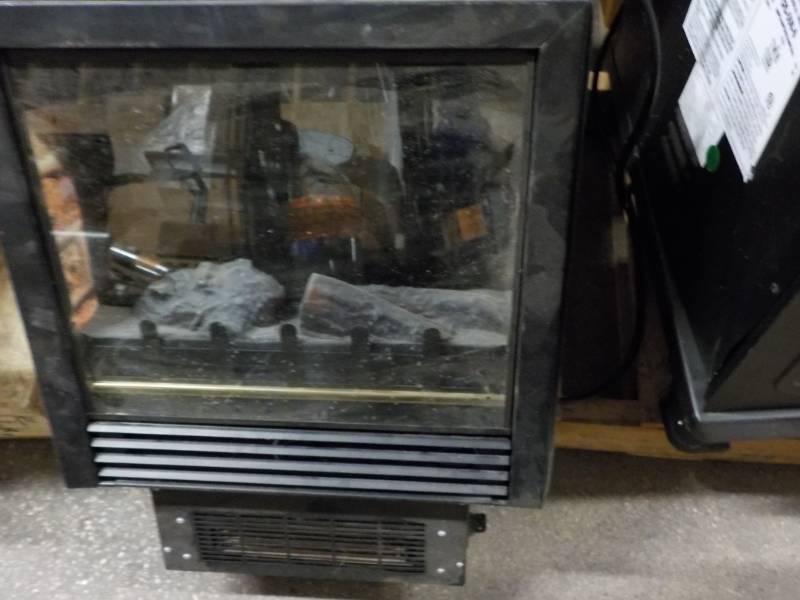 lot 60 image: Fireplace Insert- powers on...