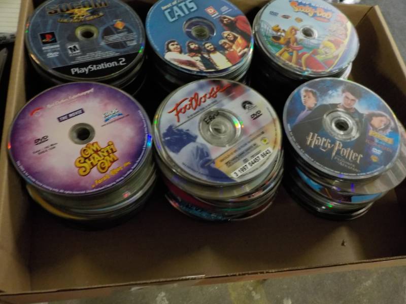 lot 206 image: 300 or more DVDs, CDs and Games...