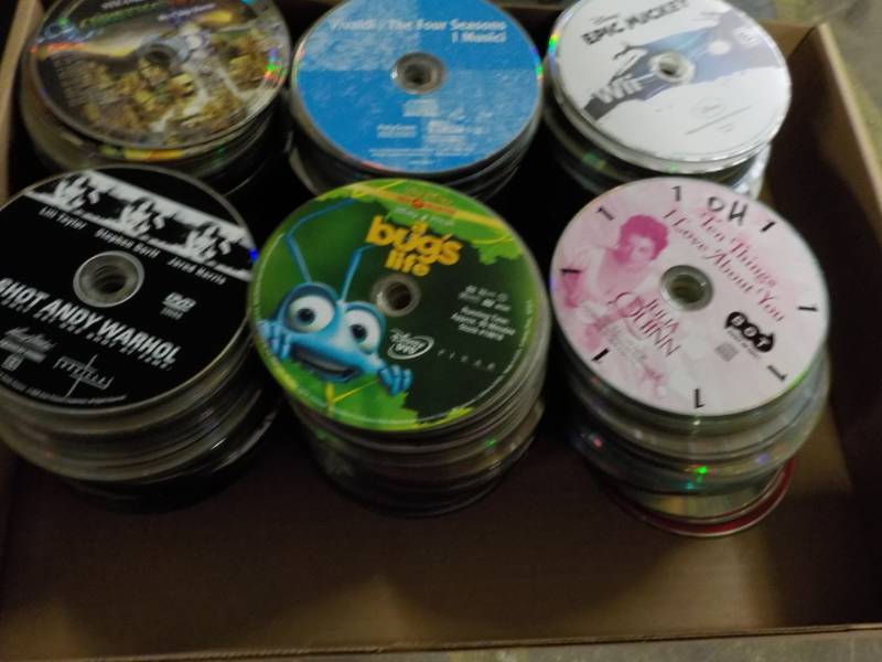 lot 208 image: 300 or more DVDs, CDs and Games...