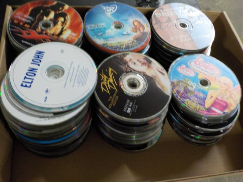 lot 209 image: 300 or more DVDs, CDs and Games...