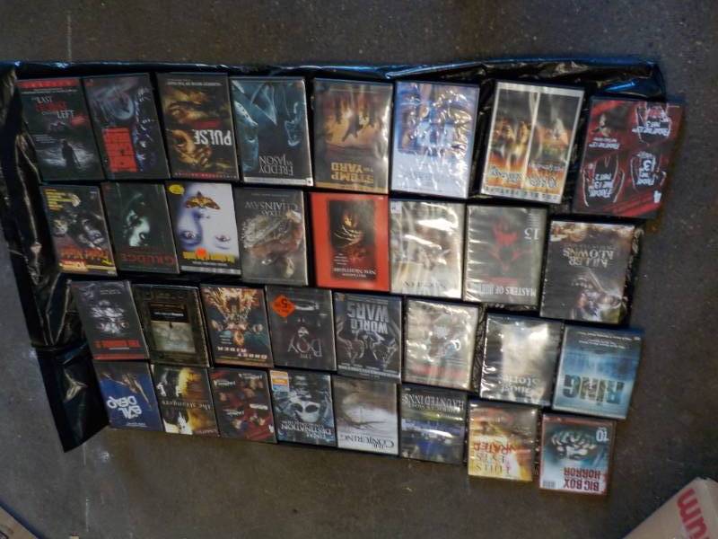 lot 229 image: 32 DVDs...