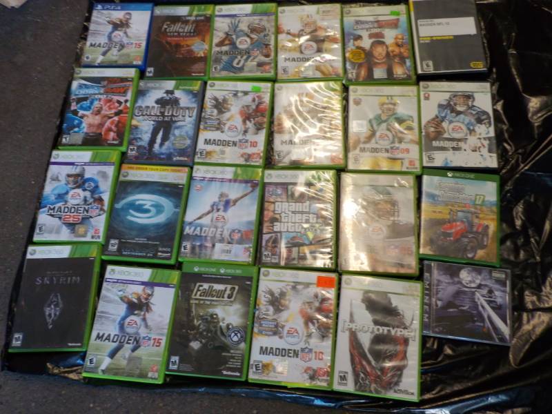 lot 231 image: Xbox 360 and PS4 Games...