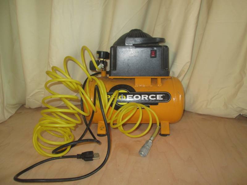 lot 7 image: Pro force air compressor with hose ...