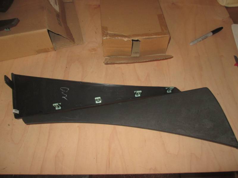 lot 35 image: Mud flaps for a C7 Corvette - front...
