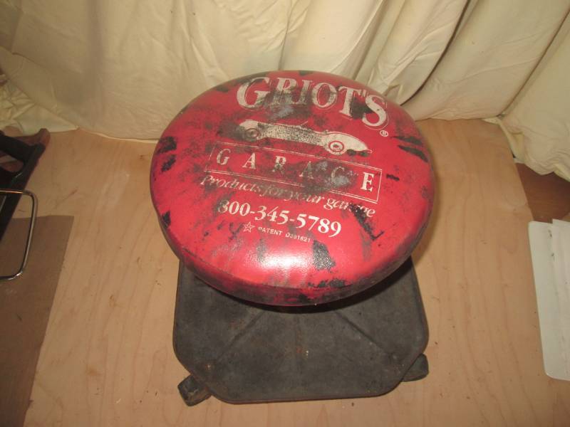 lot 38 image: Shop stool on wheels...