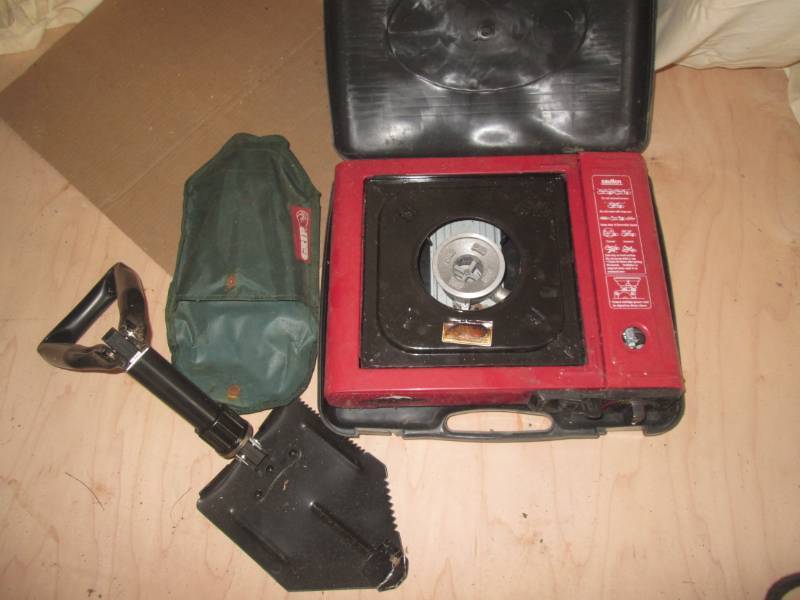 lot 54 image: Camp stove and folding shovel with ...