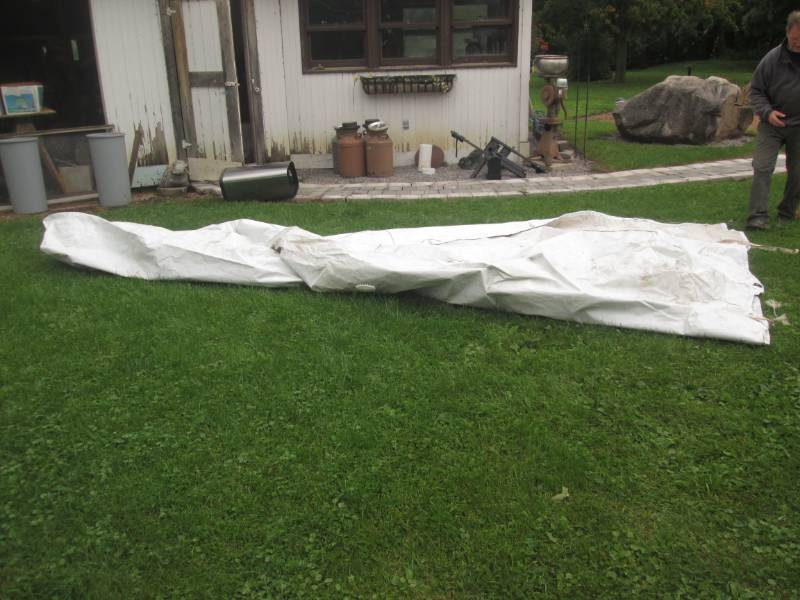 lot 73 image: Boat cover, measures 16 feet flat f...