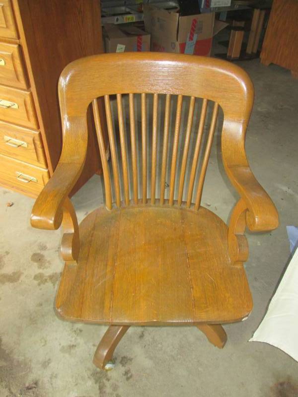 lot 165 image: Solid wood swivel desk chair...
