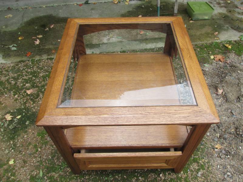 lot 172 image: Glass top end table, top is 25 x 27...