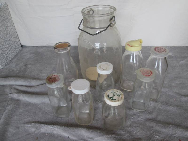 lot 180 image: Lot of milk bottles...