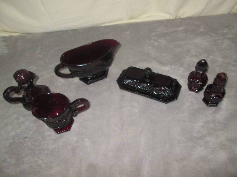 lot 232 image: Lot of Avon red glass...