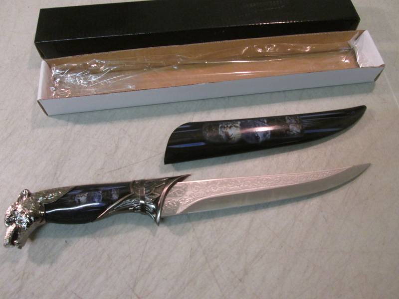 lot 55 image: 13 Black Decorative Wolf Knife wit...