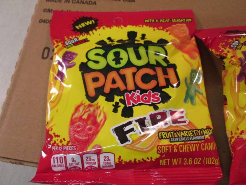 lot 144 image: Case of 12 Bags of Sour Patch Fire ...