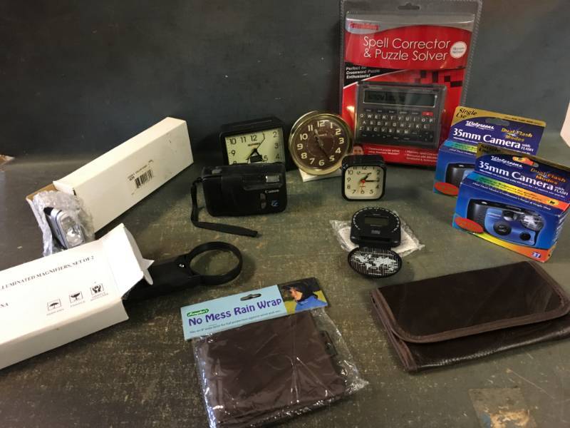 lot 189 image: Franklin Spell Corrector and Puzzle Solver, Assorted Clocks and More