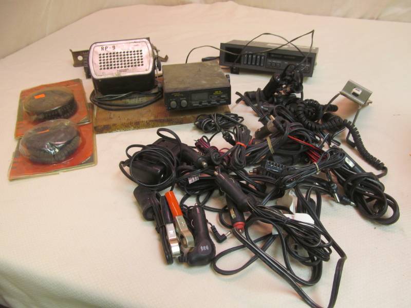 lot 35 image: GM Pickup Tape Player, CD Radio w speaker, Large Variety of DC Adapter Converters