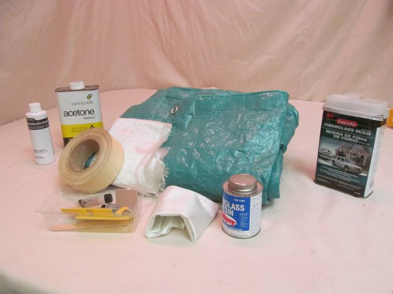 lot 36 image: Tarp, Fiberglass Repair Supplies, Resin, and more