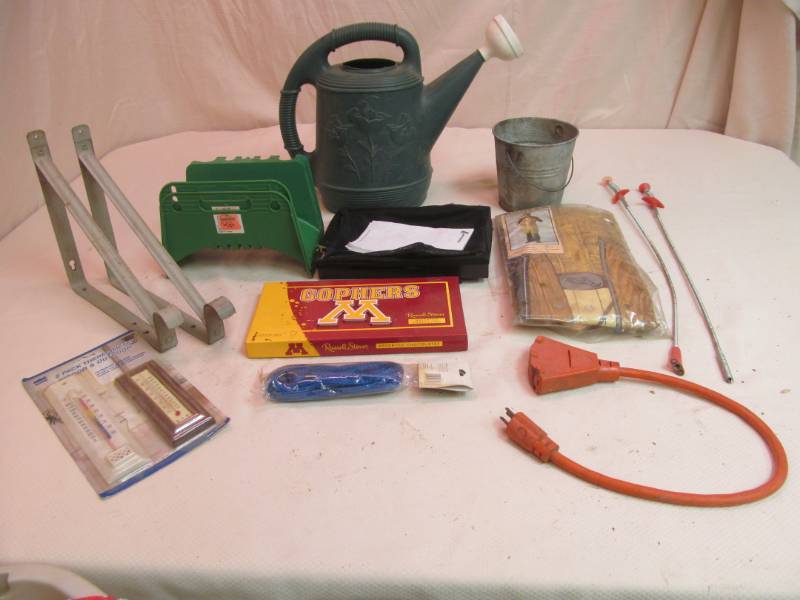 lot 51 image: Water Can, Bucket, Hose Hangers, Brackets, and more