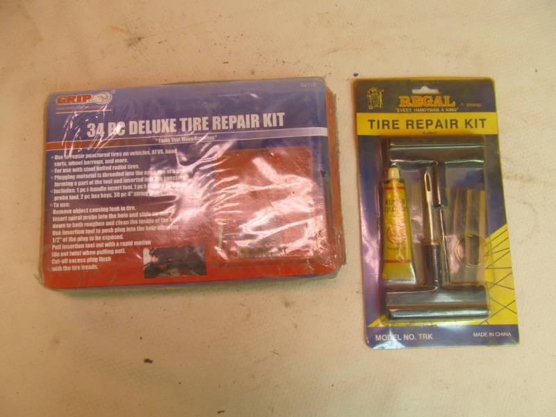 lot 87 image: NIP Tire Repair Kits