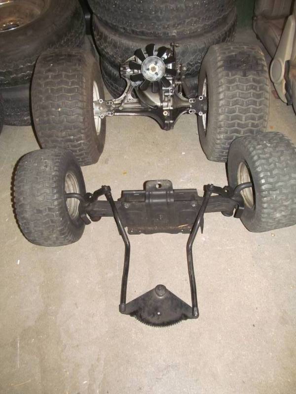 lot 177 image: Complete front axel w steering and wheels- Complete rear axel wheel to wheel