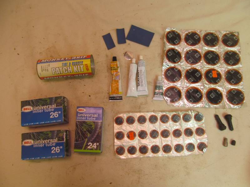 lot 189 image: NIP bike tubes, tube repair kits, patches, glue