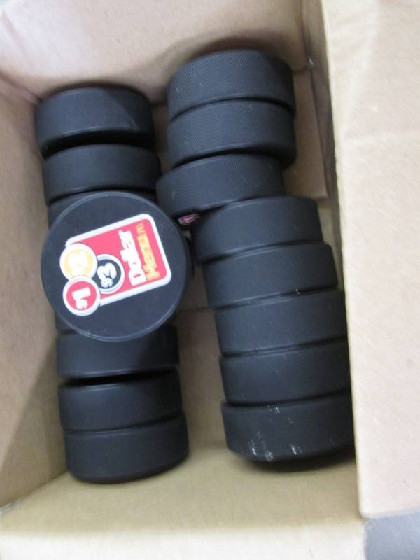 lot 146 image: Box of McDonalds Hockey pucks...