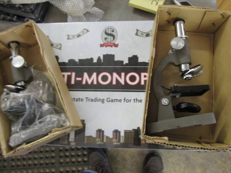 lot 225 image: 2 Microscopes, Anti-Monopoly Game...
