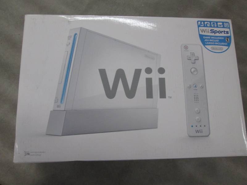 lot 244 image: Wii Console...