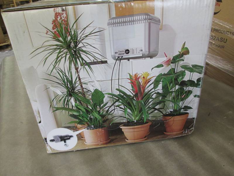 lot 282 image: Oasis Self Watering System...