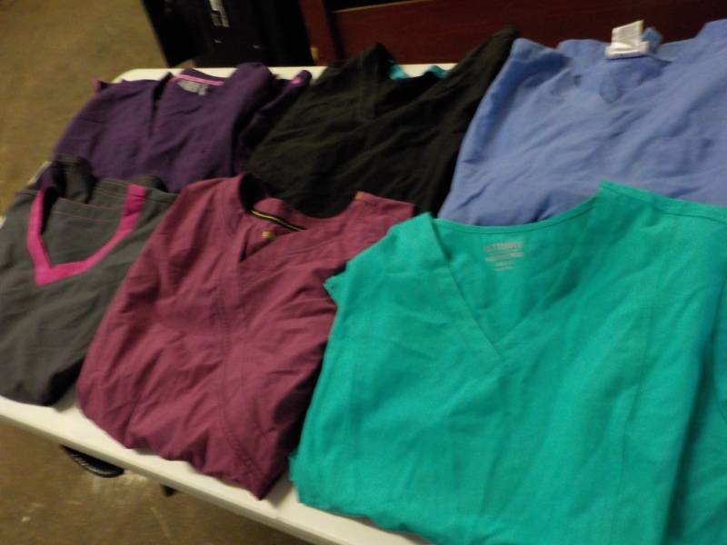 lot 10 image: Uniform tops Womens XL, Hangers, a...
