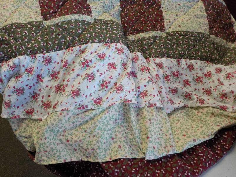 lot 12 image: King Size Bedspread in a Laundry Ba...
