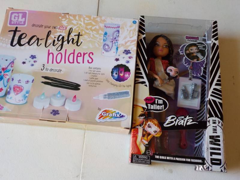 lot 128 image: New Yasmine Blatz Doll and Tea Ligh...