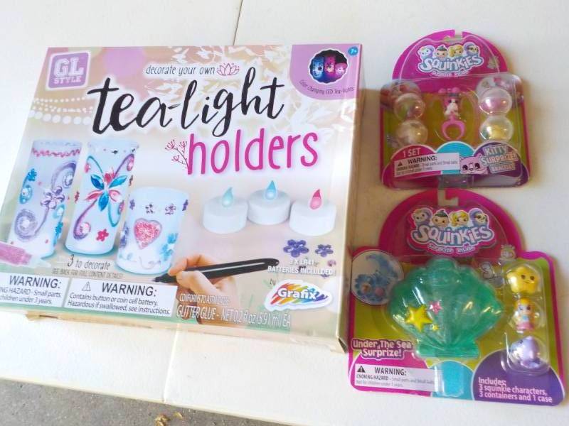lot 131 image: 2 New Squinkies Sets and Tea Light ...