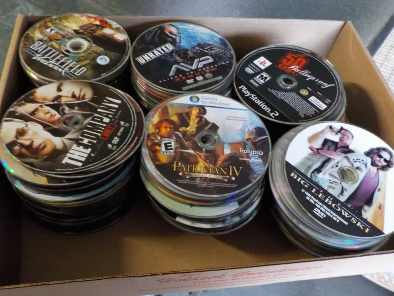 lot 158 image: 300 or more DVDs, CDs, and Games...