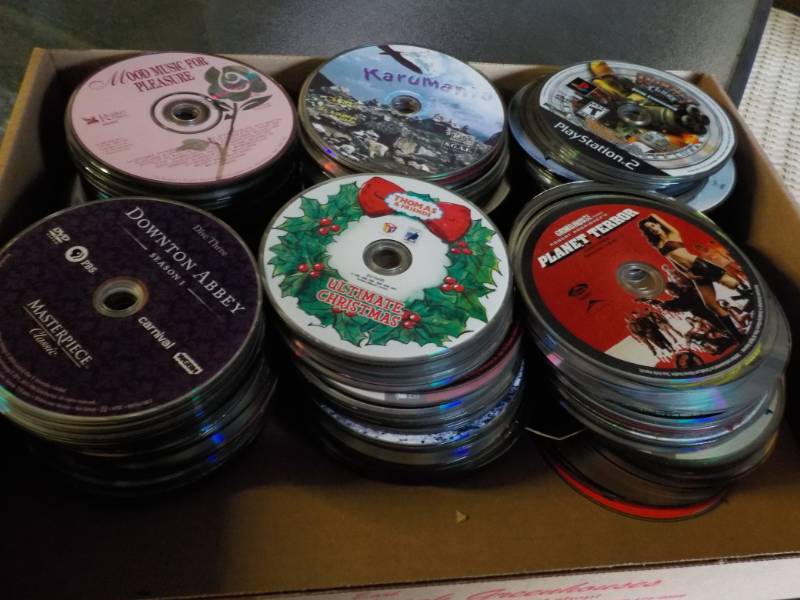 lot 159 image: 300 or more DVDs, CDs, and Games...
