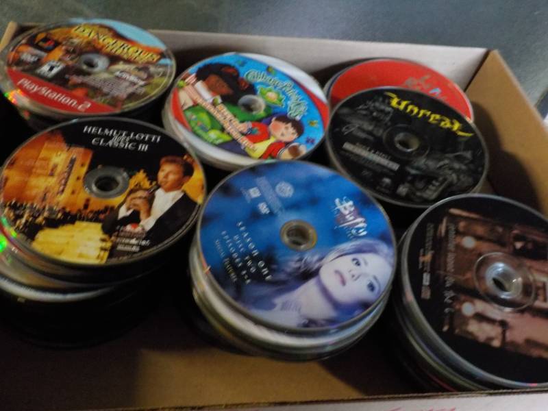 lot 160 image: 300 or more DVDs, CDs, and Games...