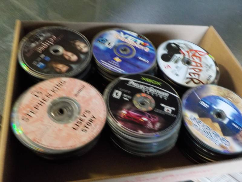 lot 161 image: 300 or more DVDs, CDs, and Games...