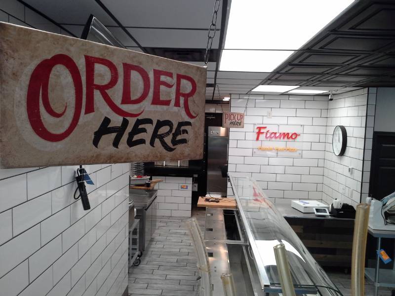 lot 119 image: Lot of (5) Wall Clock, Wall Dcor, Commercial Signs - Order Here, Pickup Here, Fiamo Flamin Fast Pizza, 48x48in. Dough Photo