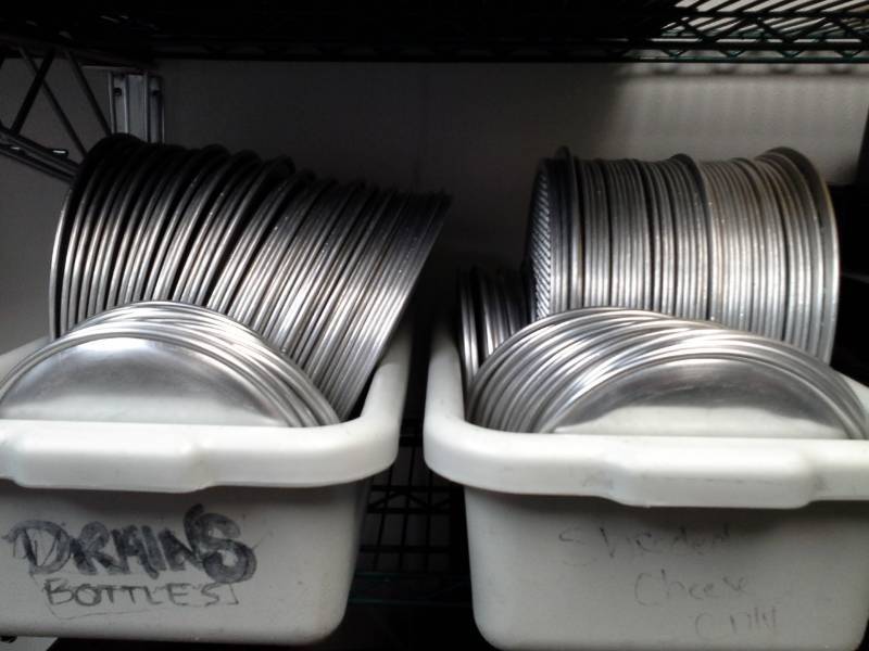 lot 134 image: Lot of (Approximately 175) 50-Aluminum Pizza Trays, 50-Aluminum Pizza Screens, 75-8in. Aluminum Pizza Trays