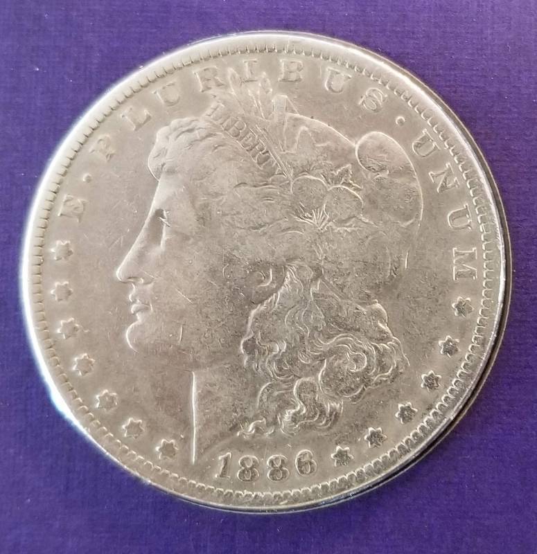 1886-O MORGAN SILVER DOLLAR AS PICTURED