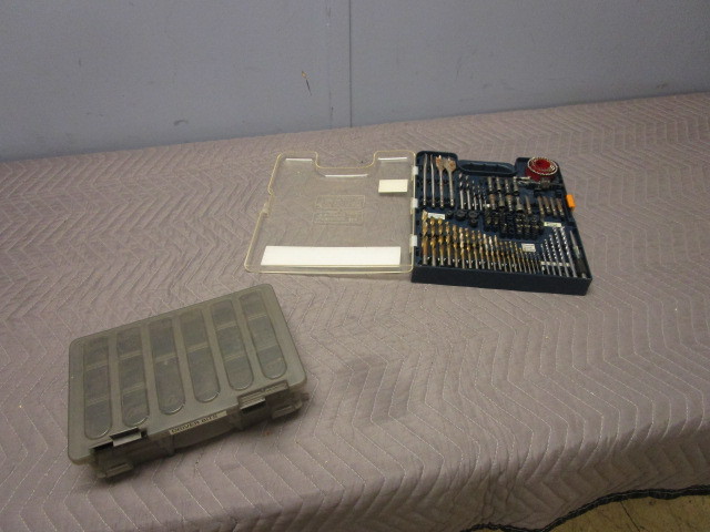 lot 324 image: RYOBI DRILL SET AND PLANO STORAGE BOX